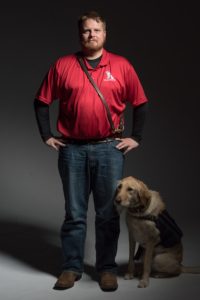 Adam LeGrand with his dog, Molly