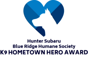 outline of dogs head in blue heart