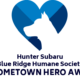outline of dogs head in blue heart