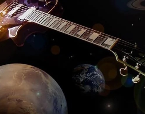 A guitar surrounded by planets