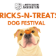 A graphic with a dog and the text "Tricks-n-Treats Dog Festival"
